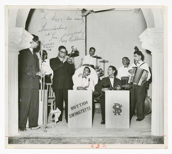 Photograph of Dizzy Gillespie playing the trumpet in Karachi, Pakistan