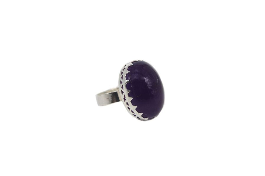 Oval Amethyst In Prong Setting